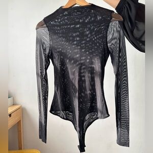 Iris long sleeve mock neck mesh bodysuit 
Size M